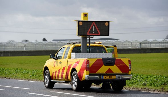 Weginspectievoeruit voorzien van een LED informatiepaneel, ook wel Autodrip genoemd