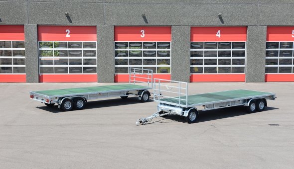 Open schamelwagen voorzien van aluminium zijslagen en betonplex vloer