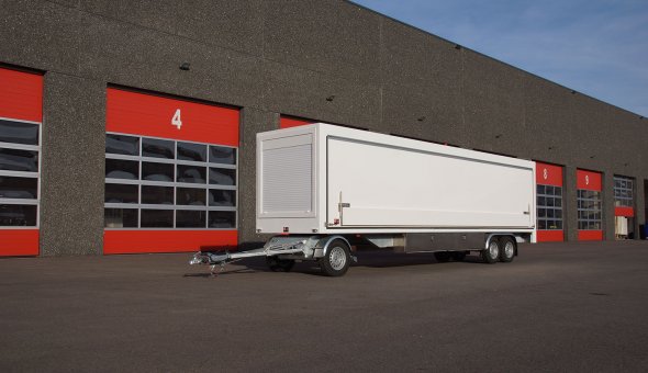 Custom built box van trailer with movers and hydraulic sides from plywood