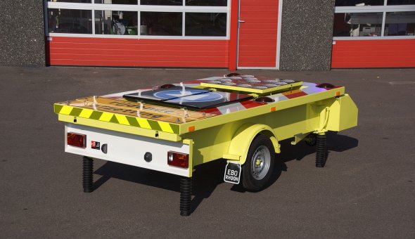 Traffic warning trailer with flashing LED arrow for a better visibility