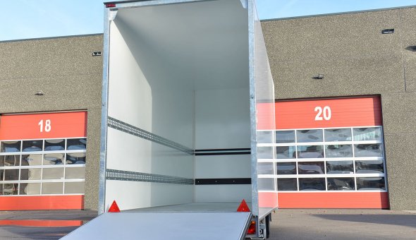 Triple axle flower trailer with Load-lok and plywood panels