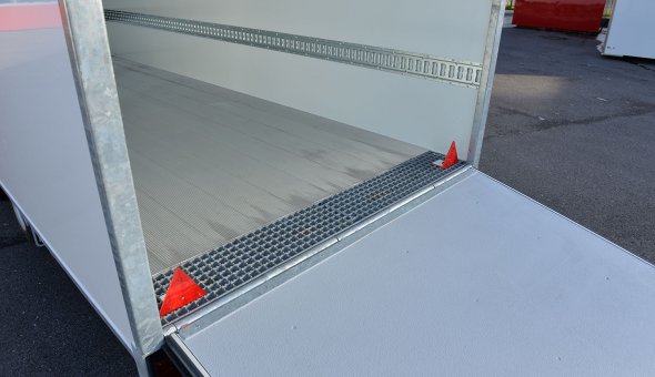 Triple axle flower trailer with Load-lok and plywood panels